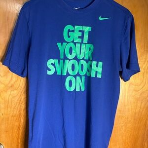 Nike Men's Blue Tee with Green Slogan